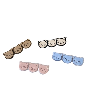 Cute cartoon cat hair clips set in four colors with three smiling kitten heads