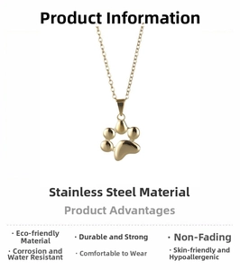 Detailed view of the hollow paw pendant on a gold-plated stainless steel chain