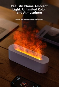 Detail of white 3D flame humidifier creating cozy mist on a wooden desk with a laptop