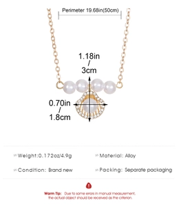 Detail of shell pendant necklace with pearls and alloy material specifications