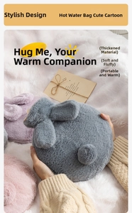 Detail of plush rabbit hot water bottles with soft faux fur and cute 3D ears