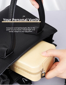 Palm-sized gold PU leather jewelry case shown fitting easily into a handbag