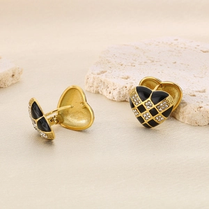 Checkered heart stud earrings in black and gold finish with sparkling diamond accents