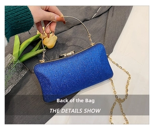 Back view of blue sequin evening bag with gold metal handle and chain strap detail