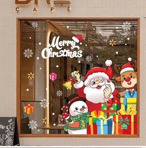 Detailed Christmas window stickers featuring Santa and reindeer on a cafe glass storefront