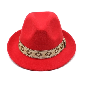 Red wool felt fedora hat for women with ethnic embroidered band on white background