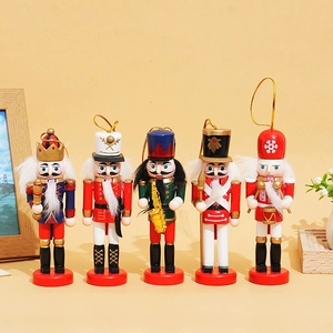 Detailed set of five 13cm wooden Christmas nutcracker soldiers on a warm yellow background