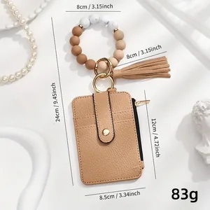Silicone and wood bead wristlet keychain with camel faux leather card holder and tassel