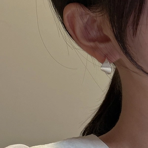 S925 sterling silver drop earrings with textured vertical stripes on a model