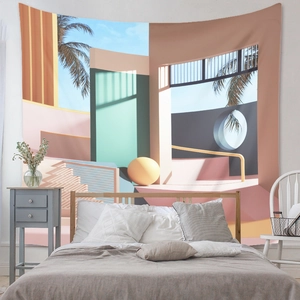 Detailed view of bohemian tapestry with tropical palm trees and pink geometric architecture