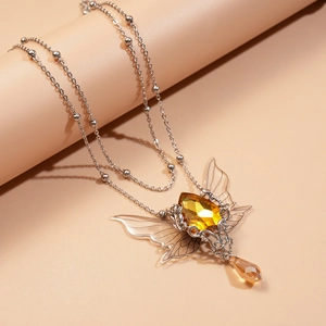 Detail of silver double layer necklace with amber crystal butterfly and teardrop charms
