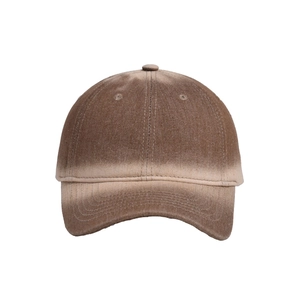 Detailed view of the gradient brown denim baseball cap with vintage washed texture