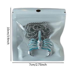 Silver scorpion pendant necklace in packaging with size labels showing 10x7cm dimensions