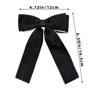 Detailed size specifications for the elegant black textured bow hair clip