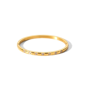 Elegant 18k gold plated stainless steel bangle with seven sparkling white zircons