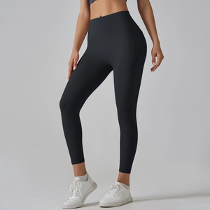 Side view of high-waisted black yoga leggings showing seamless compression and lift