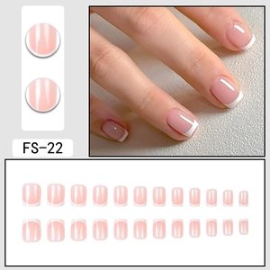 Short square French tip press-on nails set in elegant nude pink and white gloss finish