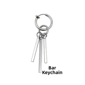 Detail view of silver stainless steel clip-on earrings with triple square bar pendants