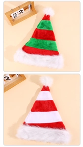 Detail of red, green and white striped plush elf hats with white pom-poms for Christmas