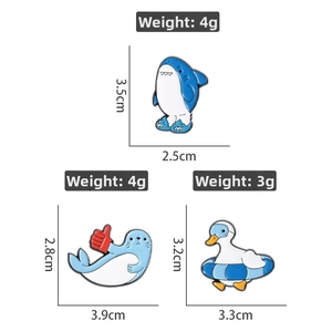 Detailed size chart for cartoon shark, duck, and seal enamel pins with weight specs