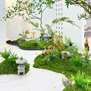 Zen garden detail with artificial moss, stone lanterns, and bamboo water fountain