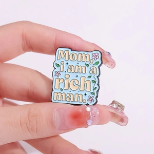 Creative enamel brooch pin with blue background, pink flowers and rich man quote