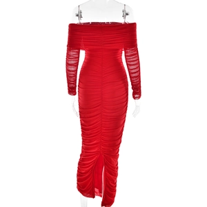 Detail shot of the red off-shoulder ruched mesh dress with elegant pleats and textures