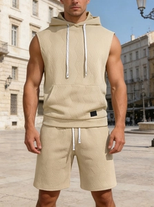 Detail of men sleeveless hoodie set in khaki with waffle knit texture and drawstrings