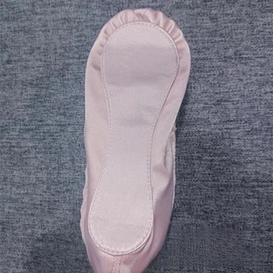 Detailed interior of a pink satin ballet shoe pencil case showing smooth inner lining