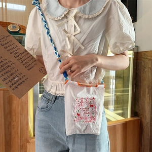 Mini sac bandoulière en tissu oxford blanc avec broderie d'étoiles et cerises roses