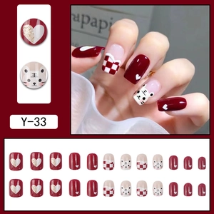 Tiger pattern press-on nails with red checkerboard and gold glitter heart design