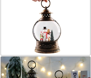 Detailed view of vintage bronze Christmas lantern with snowman and reindeer inside
