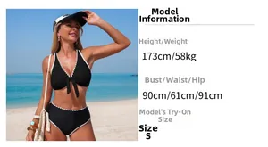 Size guide with model measurements for two-piece black bikini with white scalloped trim