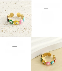 Macro detail of adjustable 18K gold plated stainless steel enamel evil eye open ring