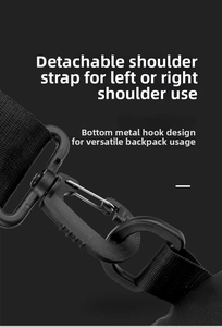 Detail of the detachable plastic swivel hook and D-ring on a durable black crossbody bag