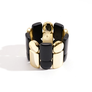 Elastic bracelet with alternating square gold metal and black matte acrylic blocks