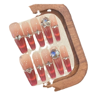 Handmade gradient red cat eye press-on nails with sparkling rhinestones and heart gems