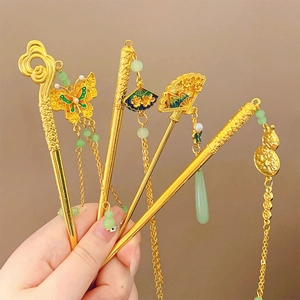 Handheld vintage gold hairpins set with green beads and traditional Chinese tassels