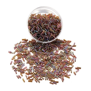 Iridescent purple Czech glass bugle beads in a clear container for DIY jewelry making