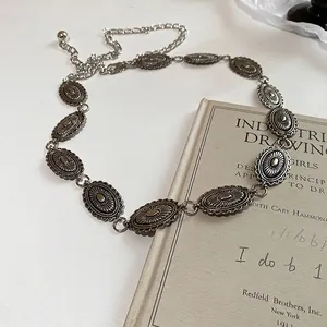 Vintage silver metal waist chain with oval embossed butterfly charms for dresses