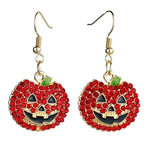 Halloween pumpkin earrings featuring sparkling red rhinestones and gold-tone metal hooks