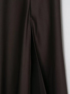 Detailed side slit view of a glossy satin sleeveless maxi dress with smooth texture