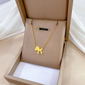 Minimalist gold plated titanium steel necklace with a cute pony pendant in a jewelry box