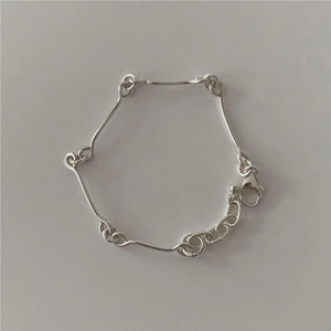 Minimalist S925 sterling silver chain bracelet with irregular geometric curved links