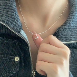Elegant 925 sterling silver star pendant necklace shown on a model for daily wear