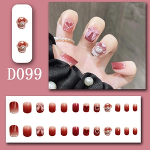 Pink gradient press-on nails featuring Duffy bear, 3D bows, pearls and heart accents