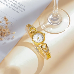 Elegant gold quartz watch for women with hollow heart link bracelet and crystal accents
