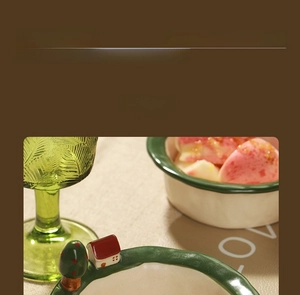 Detail of 3D house decoration on ceramic bowl with retro green rim and underglaze finish