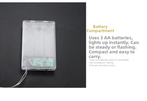 Macro detail of 3 AA battery box for LED string lights with dual flash and steady modes