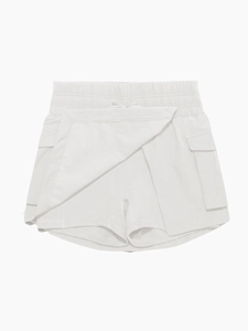 Detail of white high-waist sports skort featuring elastic drawstring and cargo flap pocket